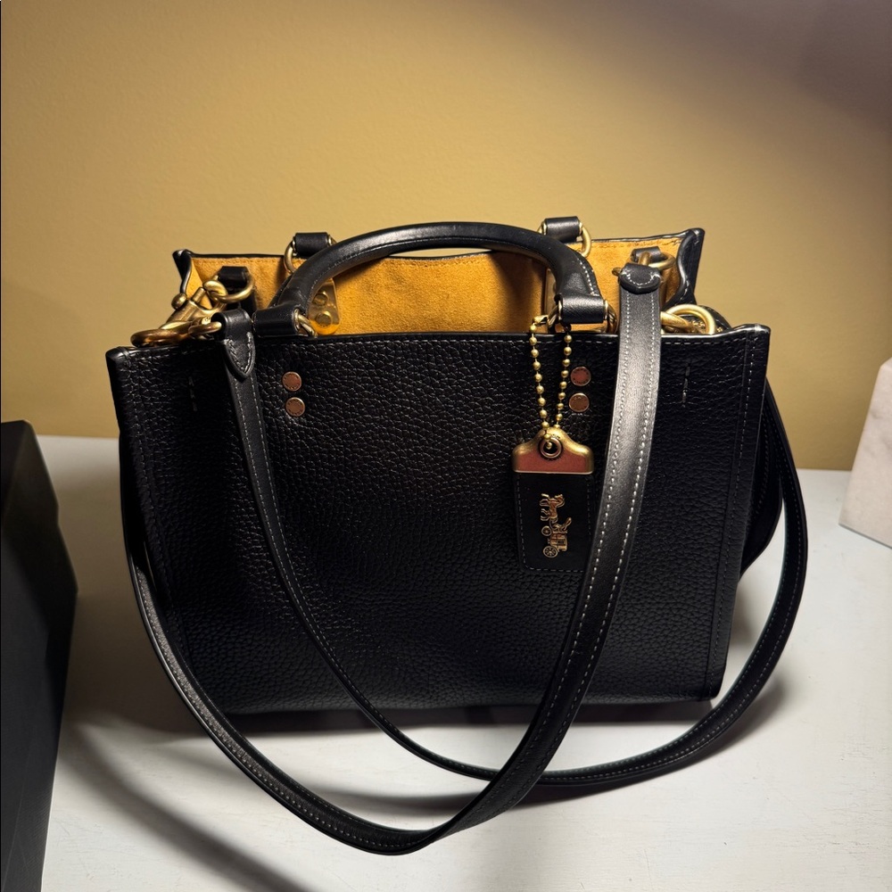 Coach Rogue 25 - Black with Brass Hardware